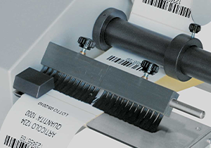 Riavvolgitori dispensatori etichette e stampanti per etichette